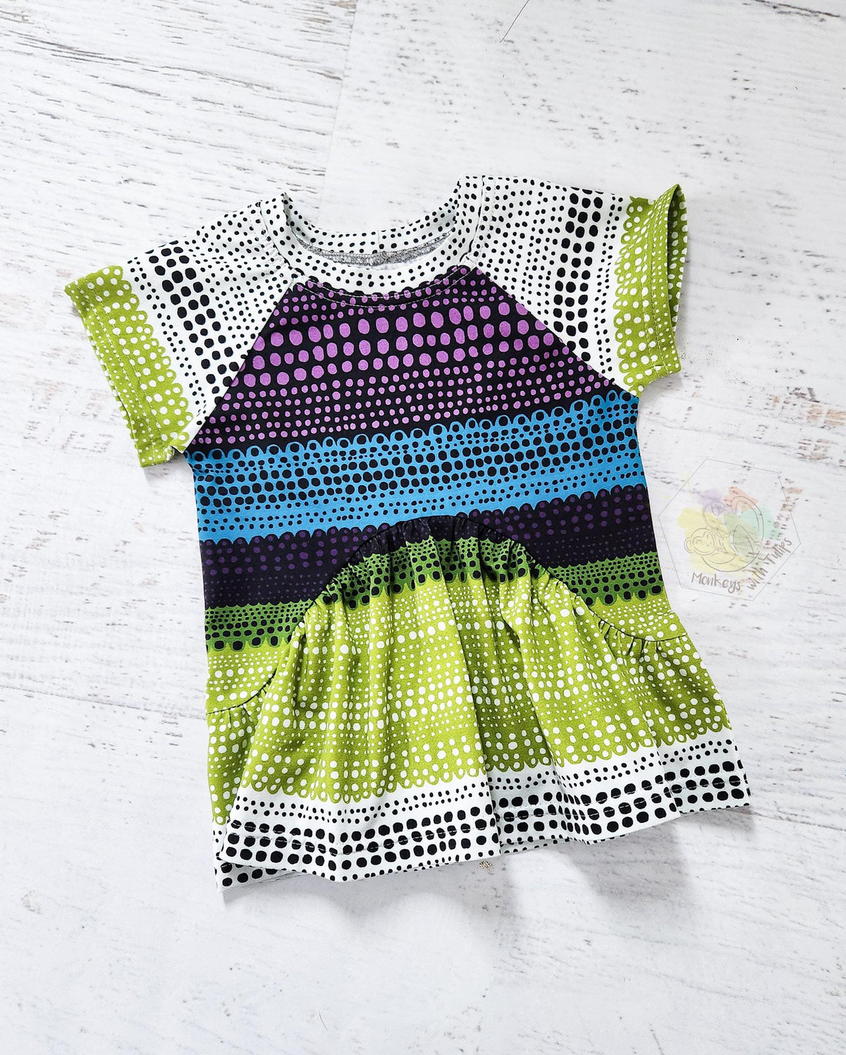 Curved front peplum, lace print cool colors, sz 2