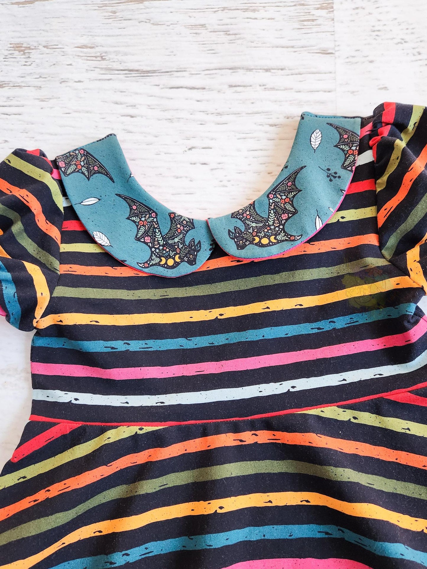 Bat collar striped peplum, size 6