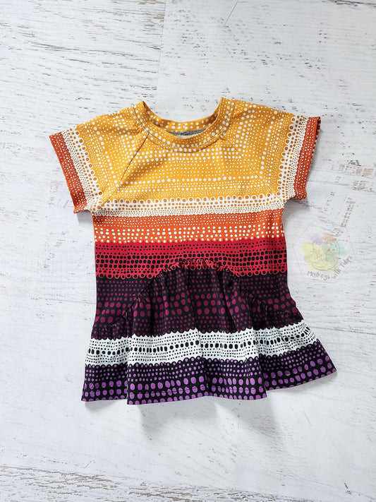 Curved front peplum, warm colors, size 4t