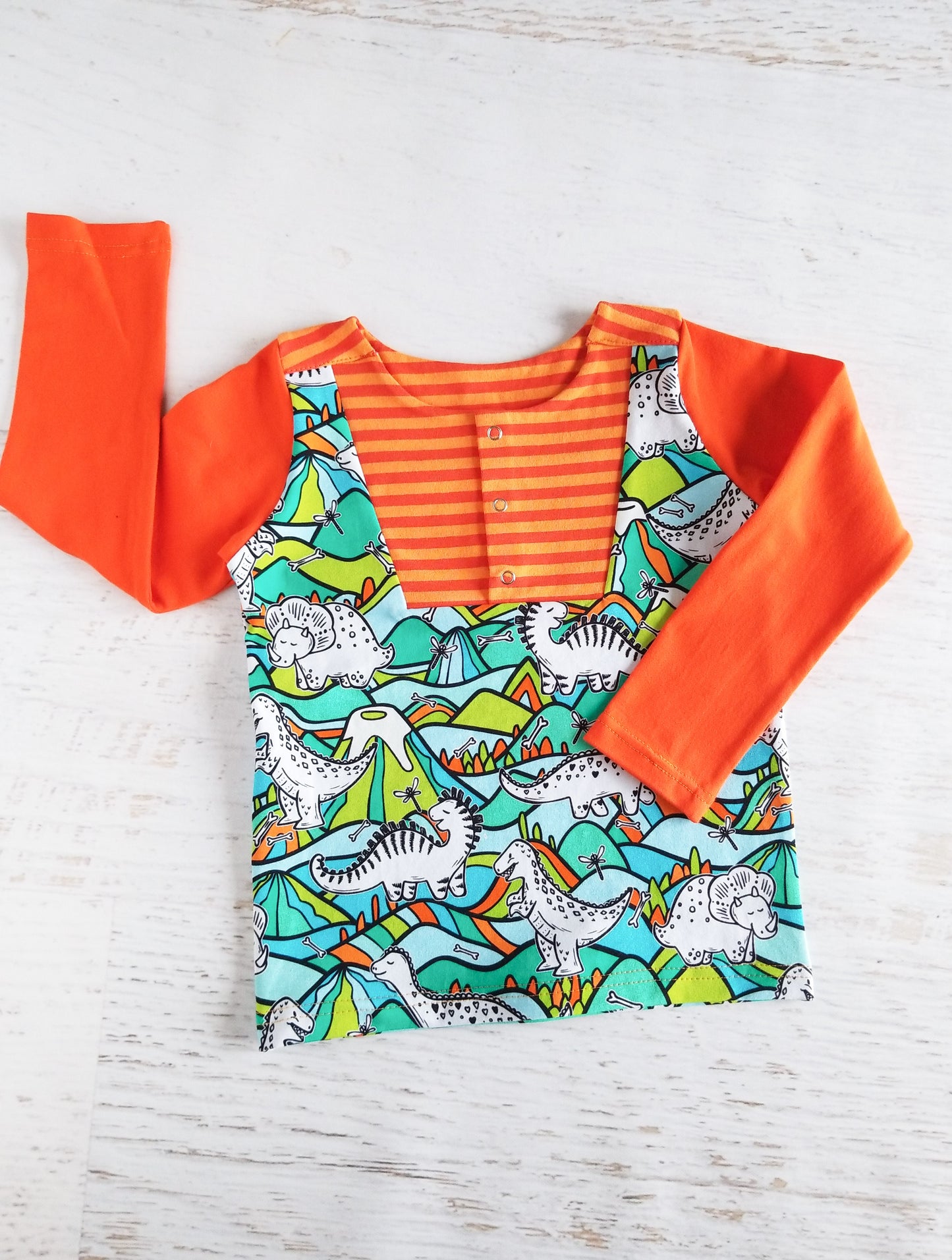 Long sleeve snap front tee, orange, dinos, 2/3T