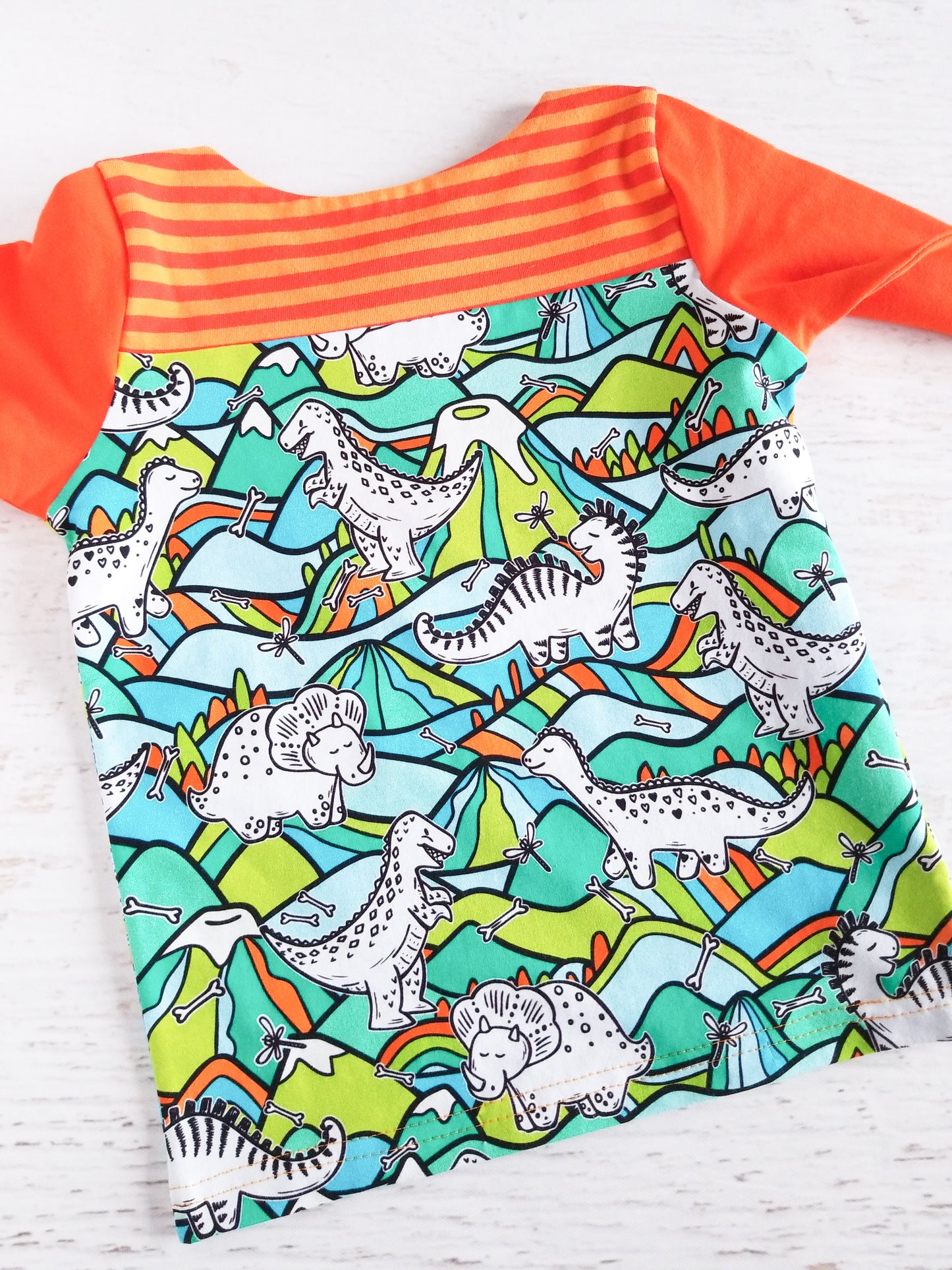 Long sleeve snap front tee, orange, dinos, 2/3T