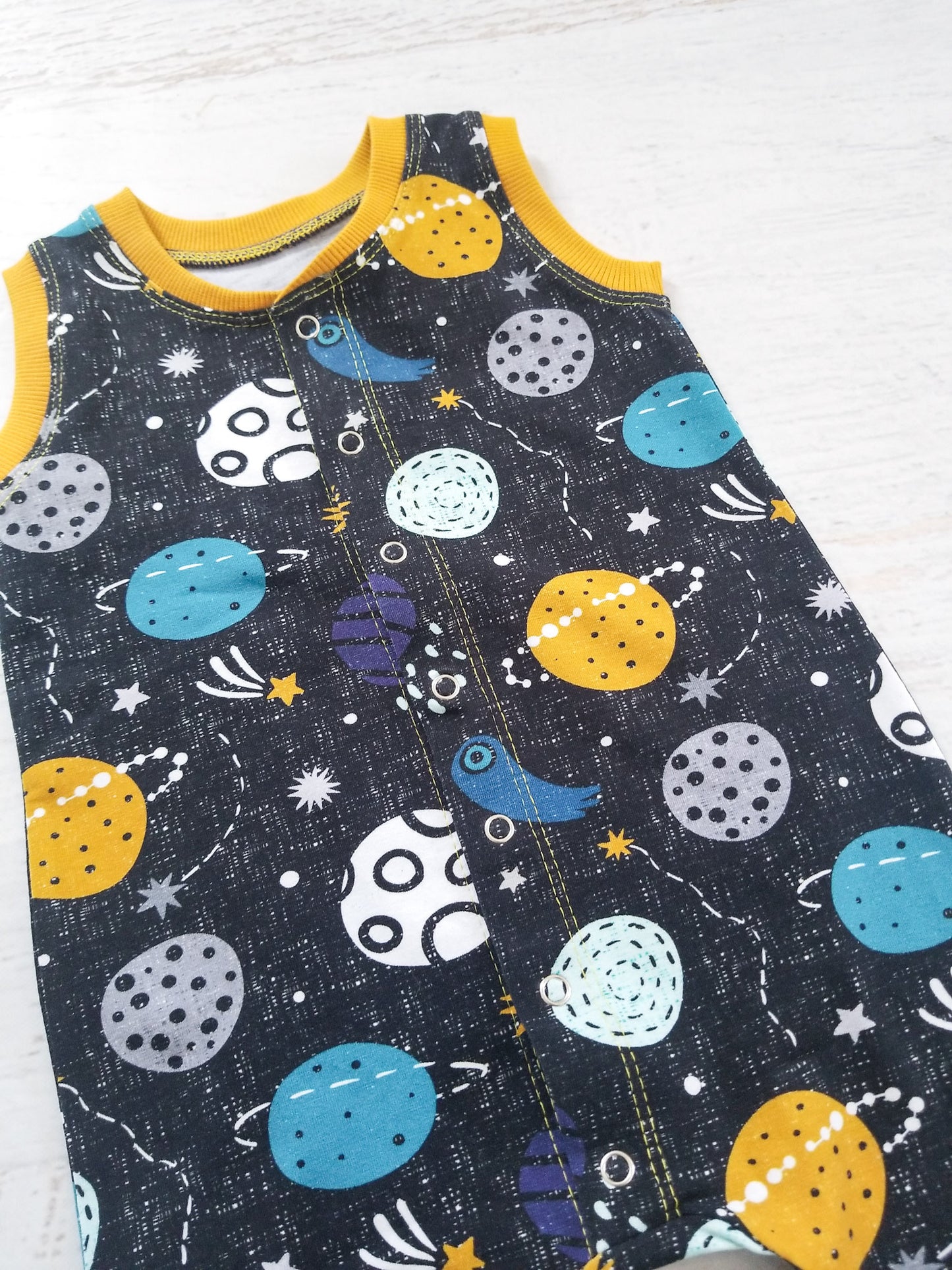 Planetary sleeveless rompaloones, size 6-9 months